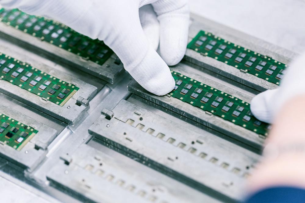 Hearing aid chip at Praesto GN factory