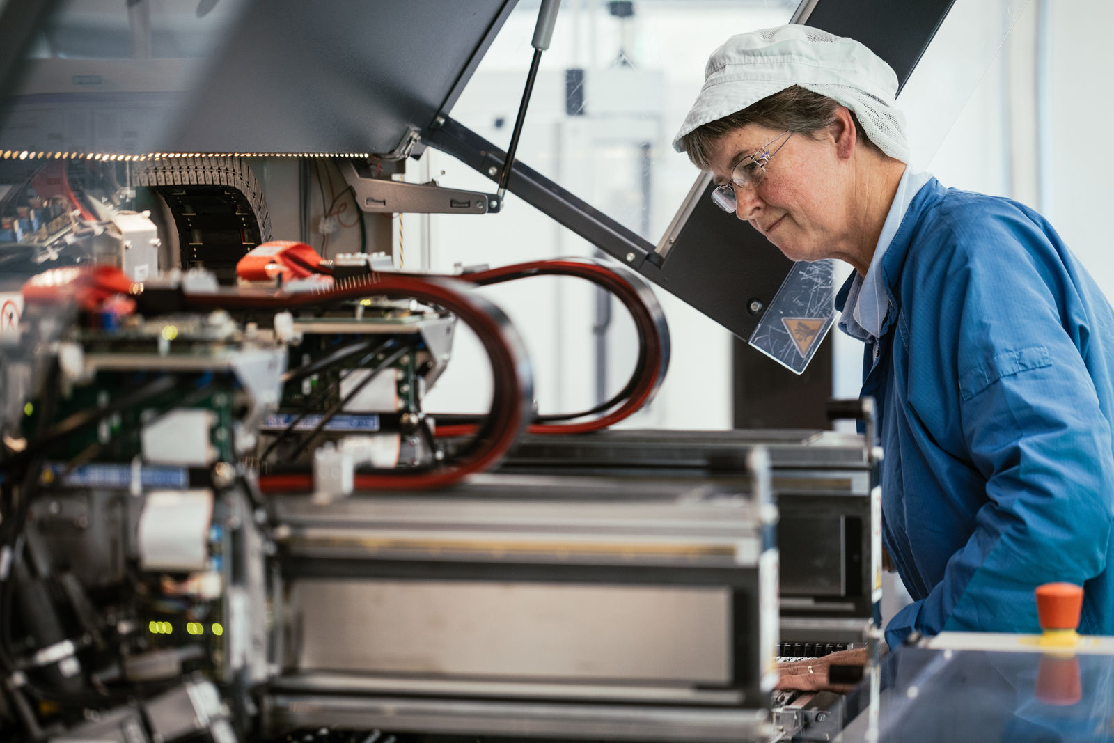 Operator Vibeke Larsen now does more interesting work monitoring robots at the manufacturing facility